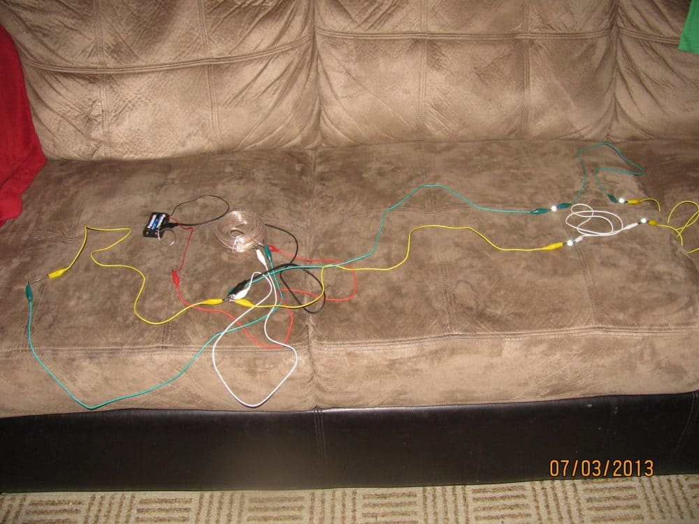 joule thief prototype showing the connection details for illuminating 4 nos of 1 watt LED using a 1.5V battery